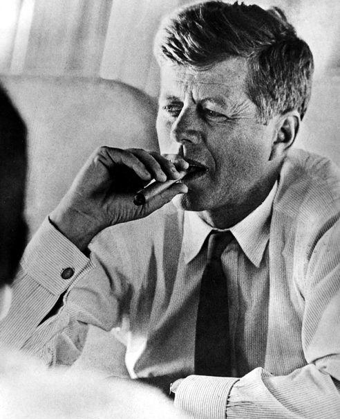 John F. Kennedy smoking a cigar